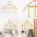 Wall-Mounted Golden Holder – Elegant Home Décor