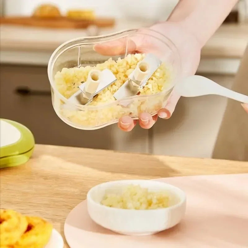 Manual Garlic Cutter – One-Handed Telescopic Slicer
