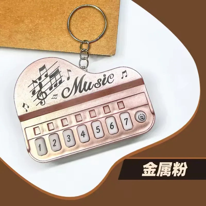 Piano Music Keychain – Mini Keyboard Design Gift (Random Color)
