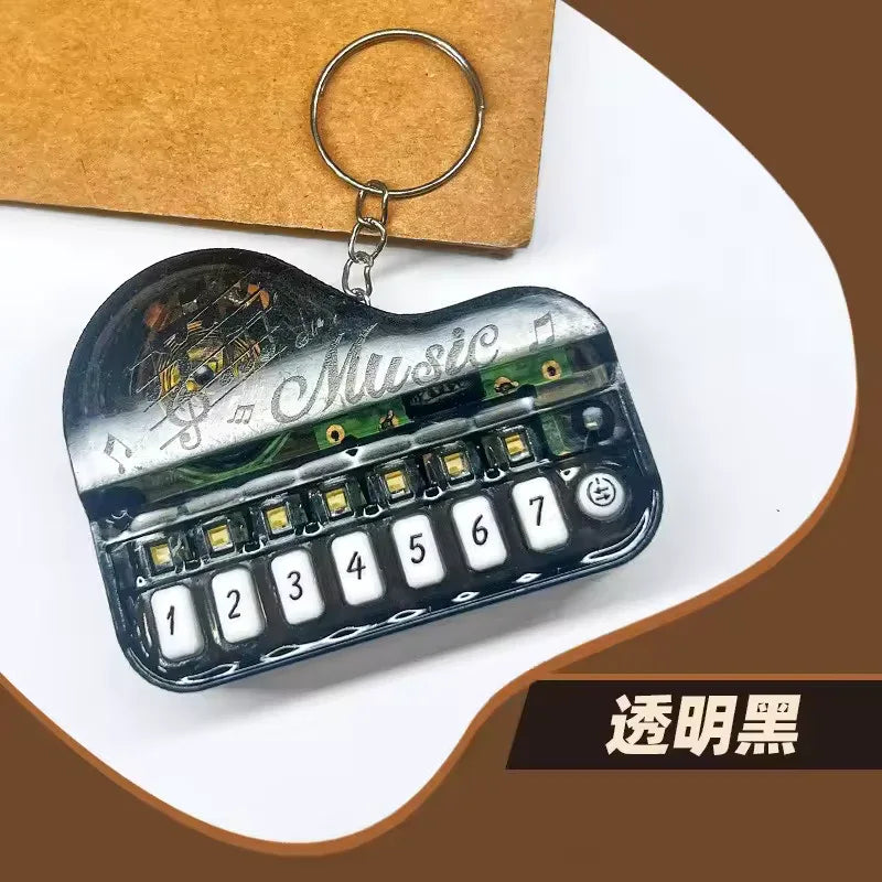 Piano Music Keychain – Mini Keyboard Design Gift (Random Color)