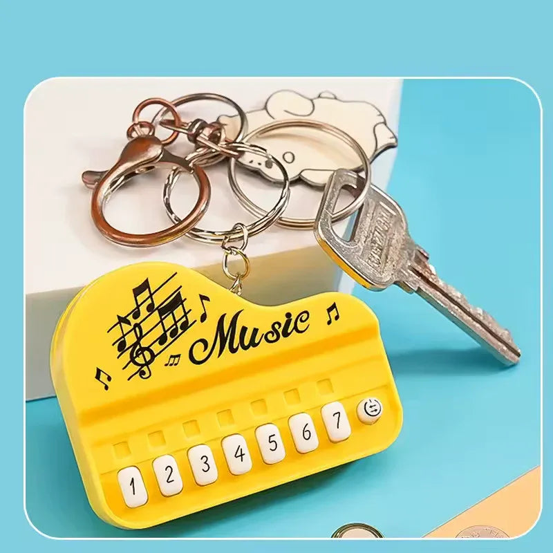 Piano Music Keychain – Mini Keyboard Design Gift (Random Color)