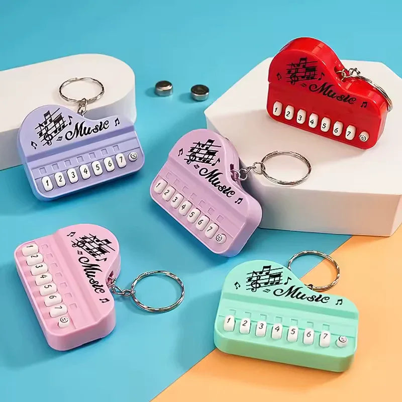 Piano Music Keychain – Mini Keyboard Design Gift (Random Color)