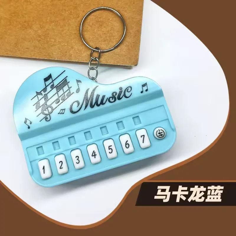 Piano Music Keychain – Mini Keyboard Design Gift (Random Color)