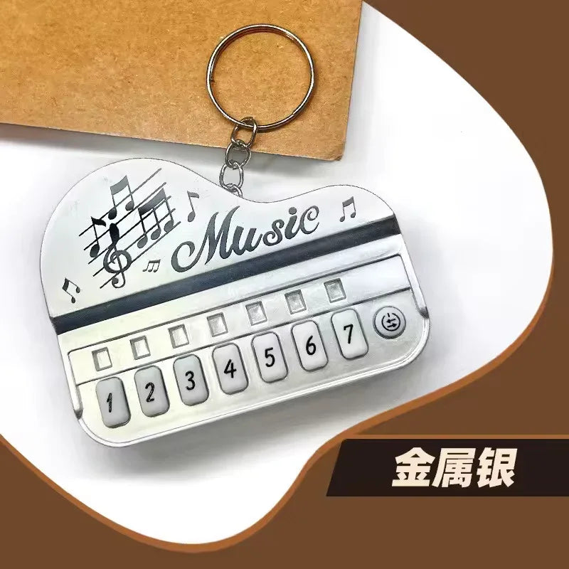 Piano Music Keychain – Mini Keyboard Design Gift (Random Color)